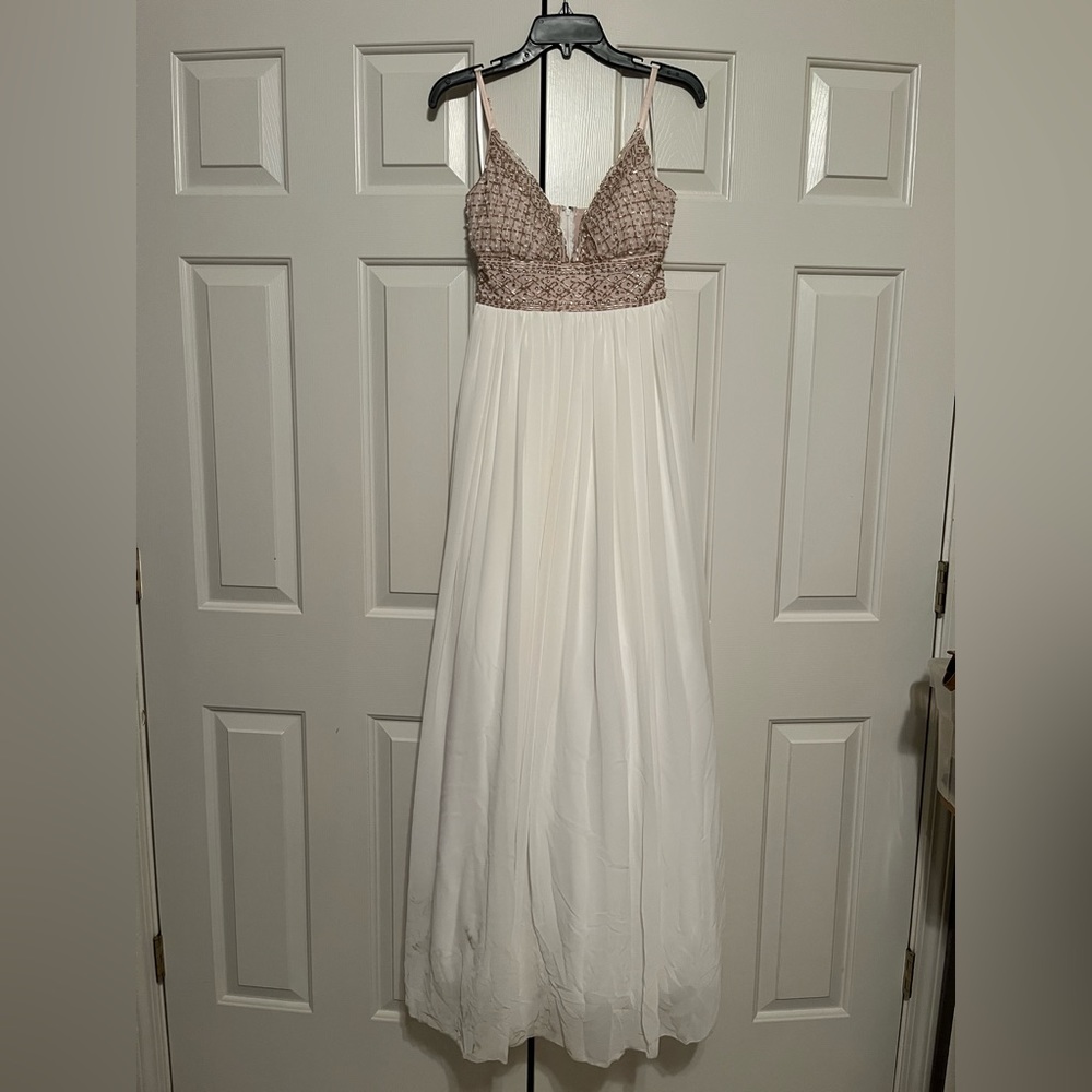White beaded formal gown